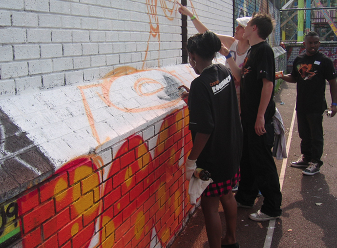 Orange Rockcorp workshop mural at Somerville Adventure Playground New Cross